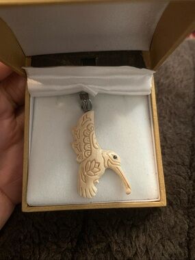 Vintage Korite Mommoth and Sterling Silver Bird Pendant